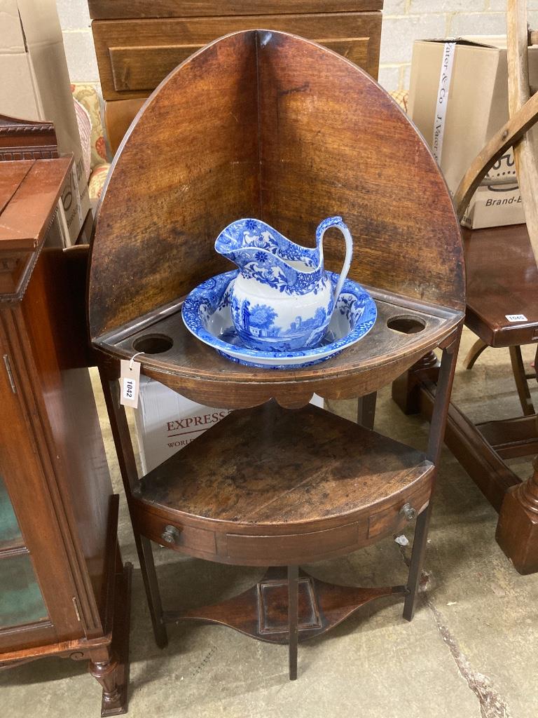 A George III corner washstand, width 62cm, depth 41cm, height 121cm together with a Spode blue and white jug and basin